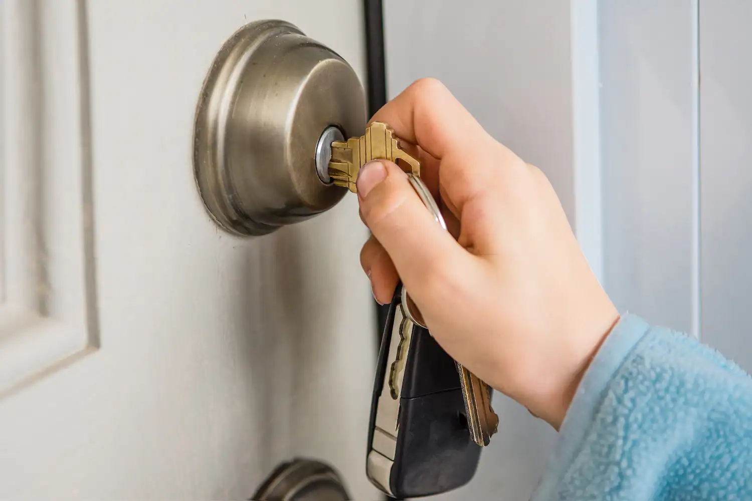 Person-using-deadbolt